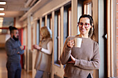 Woman standing at corridor