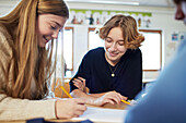 Group of students doing task in class