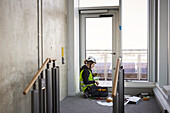 Woman working at building site