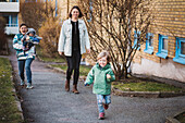 Women having walk with children