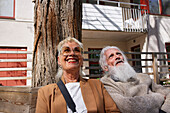 Smiling couple sitting together