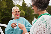 Smiling women talking together