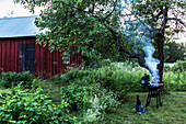 Smoking grill in garden