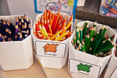 Crayons in plastic containers