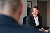 Smiling businesswoman in office