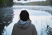 Woman looking at lake