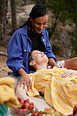 Female couple having picnic