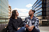 Smiling couple sitting together