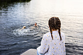 Girl looking at lake