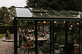 Friends having meal in garden