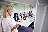 Woman having presentation at business meeting