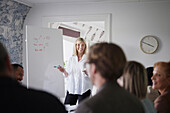 Woman having presentation at business meeting