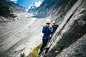 Climbers exploring mountains