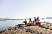 Family relaxing at sea