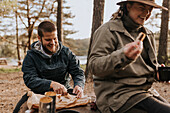 Couple having picnic at lake