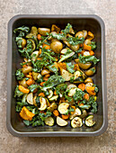 Roasted potatoes, carrots, and kale with cumin