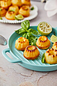 Mini bundt cakes with basil and lime syrup