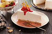 Slice of Cheesecake with strawberry sauce