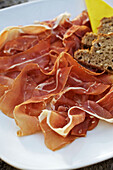 A plate with ham (close-up)