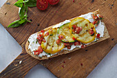 Baguette with cream cheese and grilled summer squash and zucchini slices