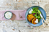 Carrot and pumpkin fritters with a side salad