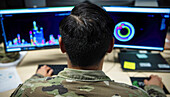 US Air Force Staff Sergeant performing network analysis
