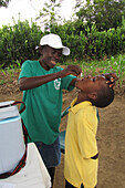 Boy receiving oral cholera vaccine, Haiti, 2013