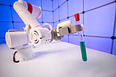 Robotic arm holding test tube