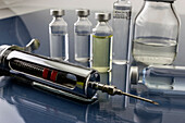 Medicine vials and syringe