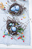 Birch wreath with Easter eggs, sugar eggs, forget-me-nots, primrose and palm catkins