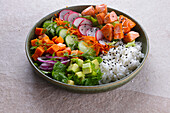 Salad Bowl with salmon and rice