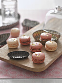 Macaroons decorated with gold leaf
