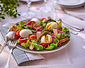 Salade Landaise (salad with foie gras, duck breast and eggs, France)