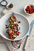 Roasted eggplant with grilled beef, beet chutney, and feta
