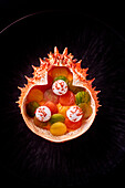 Candied fruit and tomatoes in a spider crab shell
