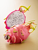 Half a Dragon Fruit with a Spoon Stuck in It