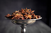 Star anise in a silver bowl