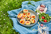 Tomato muffins with rosemary for a picnic