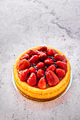 Baked cheesecake with glazed strawberry topping