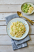 Fusilli and cheese with spring onions