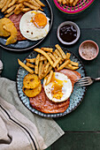 Ham steak with fried egg and chips cooked in an Air Fryer