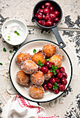 Buttermilk Donut holes with cherry compote
