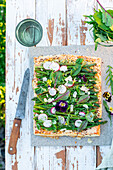 Puff pastry tart with green asparagus and radishes