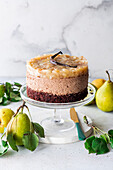 Chocolate mousse cake with poached pears