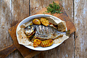 Grilled sea bream with potatoes