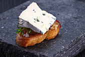 Blue cheese with chutney on toast