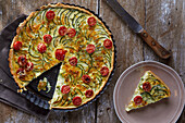 Quiche with zucchini and tomatoes