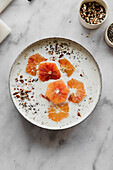 Oatmeal with milk, blood oranges, chia seeds and nuts
