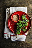 Grilled okra skewers with sesame, cilantro, and soy sauce