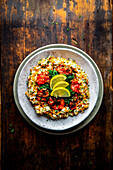 Vegan lentil rice with spinach-tomato sauce and parsley